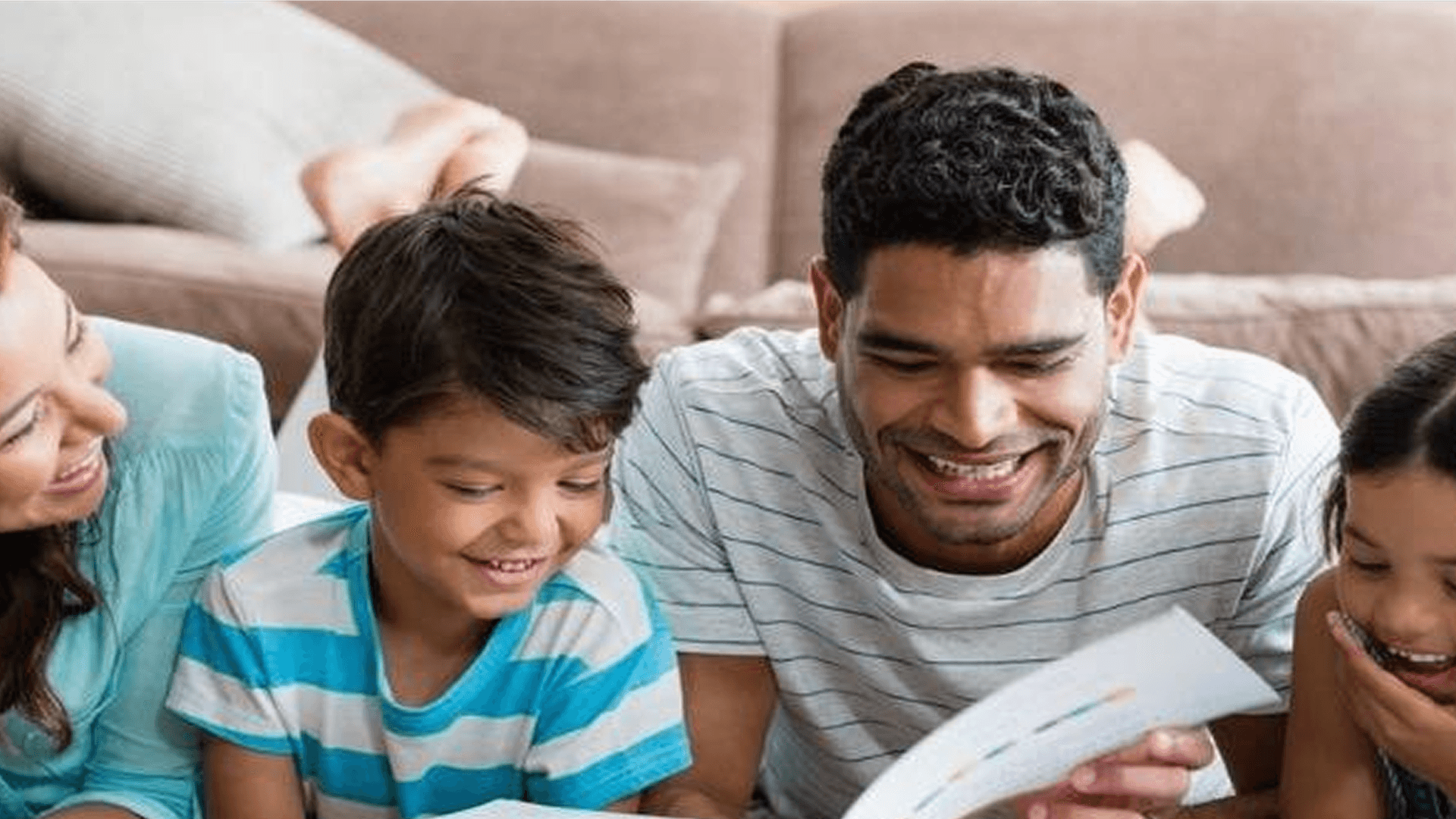 Family reading a storybook together